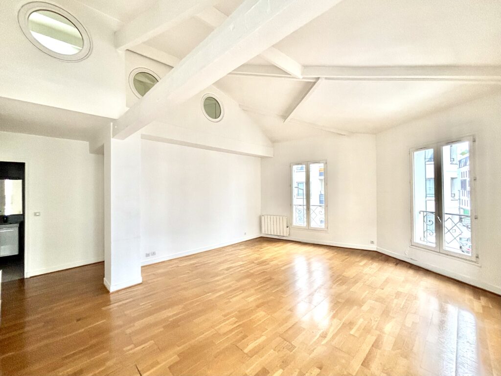photo du séjour d'un appartement à vendre à Boulogne-Billancourt par l'agence immobilière La Clef des Villes